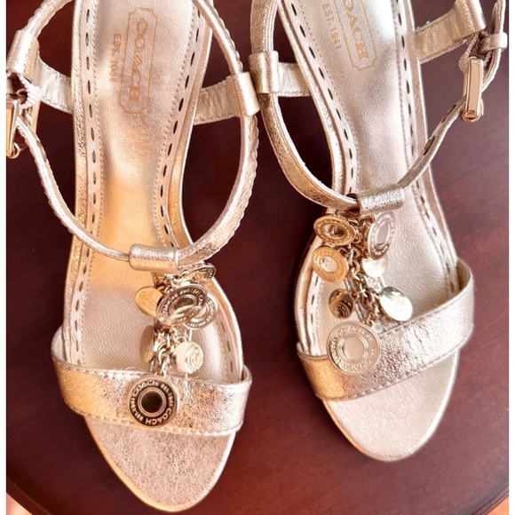 Coach authentic sandals with 3” heel, metallic gold with round gold Coach charms - Picture 1 of 4
